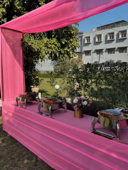 Another angle of our pink-themed outdoor buffet setup, showing how we arrange our stations for easy guest access.
