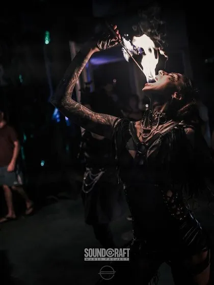 A demonstration of fire eating, one of our most spectacular and daring tricks. This act always captivates the audience and showcases extreme skill and bravery.