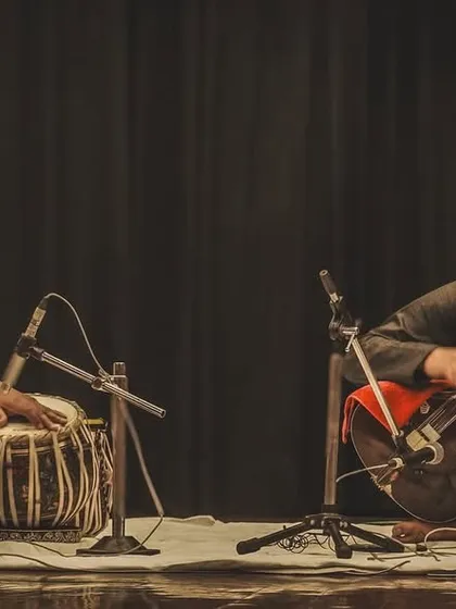 The dynamic energy of a live performance captured in a single frame. Here, Pt. Ram Kumar Mishra Ji and I are completely absorbed in the flow of the music.