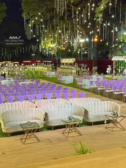 A lounge area with modern scalloped sofas, providing a stylish and comfortable spot for guests to relax.