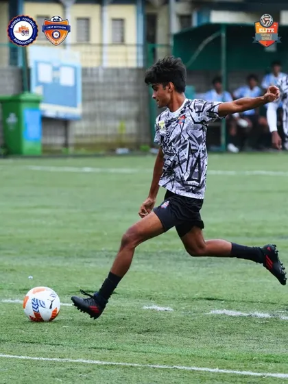 A player in mid-stride, about to make a crucial pass. Our game is built on quick thinking and precise execution.