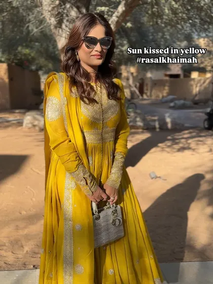 Sun-kissed in yellow for a Haldi ceremony in Ras Al Khaimah. This look is all about a warm, golden glow that looks beautiful in the sun.