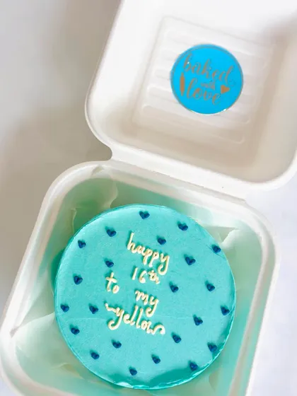 A sweet blue bento cake with a heartfelt message. This design is perfect for celebrating a special friendship.