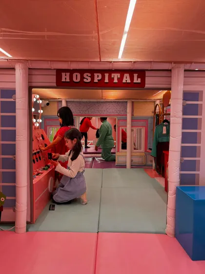 Welcome to our pretend-play hospital, where little ones can be doctors for a day. It's one of our many zones designed to spark imagination and creative thinking.