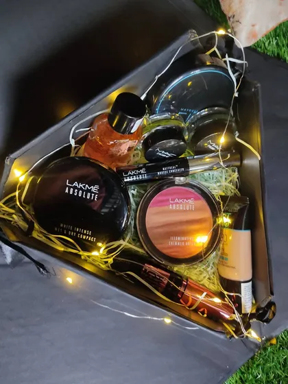 A dream come true for any makeup lover. This custom makeup box is packed with a full set of products from Lakme Absolute, including foundation, compact powder, blush, mascara, and more, all nestled in a stylish black gift box.