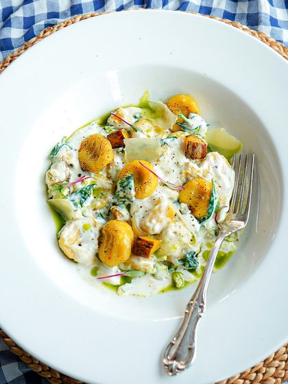 Our pumpkin gnocchi is a creative and delicious take on a Thanksgiving classic. The soft gnocchi are served in a creamy sauce, perfect for the holiday season.