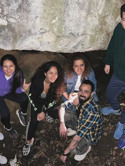 The tribe gathered together during a cave exploration on one of our treks. We mix adventure with moments of quiet connection, creating memories that last a lifetime.