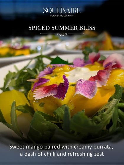 A spiced summer bliss featuring sweet mango paired with creamy burrata, a dash of chili, and refreshing zest. A unique and sophisticated dessert.