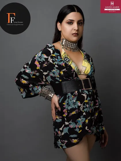 A different angle of the high fashion look, showcasing the complete styling from head to toe.