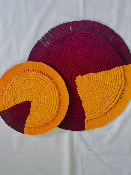 A simple shot of two color-blocked mats, one large and one small. This shows how you can order a matching set in different sizes for various uses, from coasters to placemats.