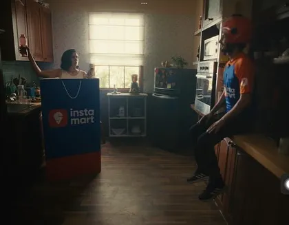 The final scene of the Swiggy ad, where the daughter is "delivered" to her mother. The contrast between her casual home clothes and the delivery partner's uniform makes the moment sweet and funny.