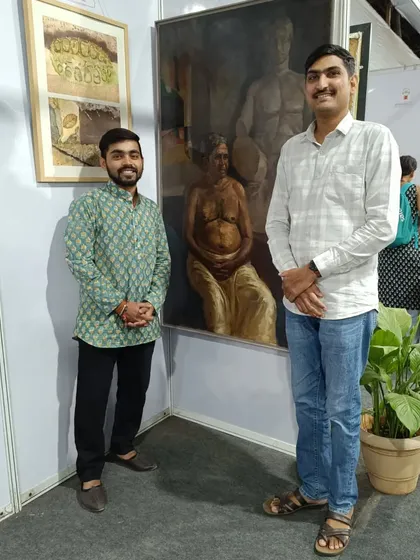 Standing with my award-winning painting "Contrast of life" at the 36th All India Lokmanya Tilak Exhibition in Pune.