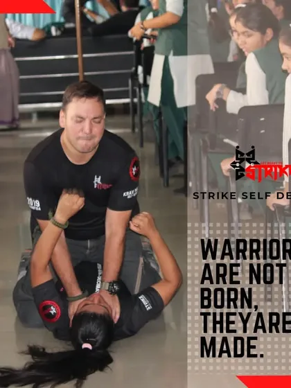 Warriors are not born, they are made. Here, I am demonstrating a ground control technique to students, showing that with the right training, anyone can learn to dominate a threat.
