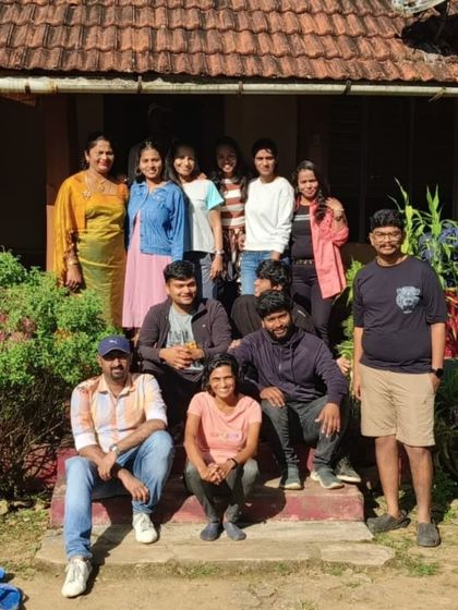 Chilling on the steps of our cozy homestay in Coorg. Our accommodations are chosen to give you an authentic and comfortable local experience.