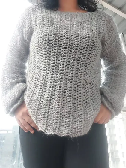 The boat neckline and comfortable fit make this Vevitha Sweater a cozy yet stylish choice.