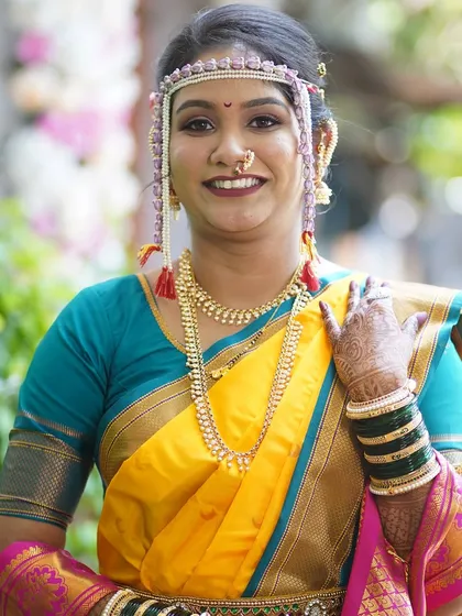A simple, elegant portrait of the bride. The makeup is soft and natural, proving that you can look stunning without heavy layers.