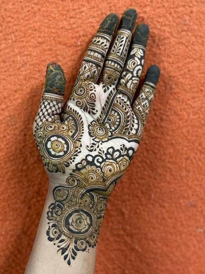 Intricate Full Hand Mehendi photo 21