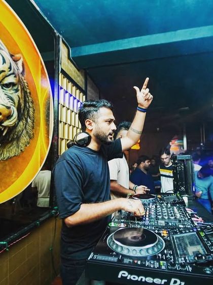 Getting the crowd hyped from the DJ booth. I love interacting with the audience and making sure everyone is having the best time possible.