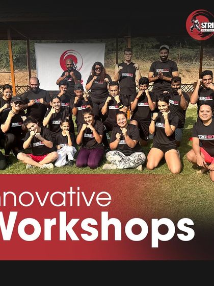 A group photo from one of our innovative workshops held outdoors. We take training beyond the four walls of the gym to create memorable and effective learning experiences.