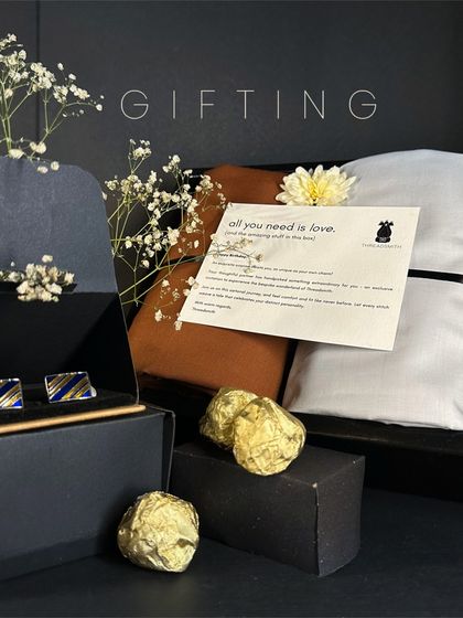 Our gifting philosophy is to offer an experience, not just an item. This thoughtfully assembled box, including fabrics, cufflinks, and chocolates, is designed for those who appreciate the finer things in life.