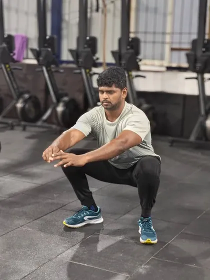 The simple but effective squat hold. This exercise builds strength and endurance in the legs and core, and is a great way to improve squat mechanics.