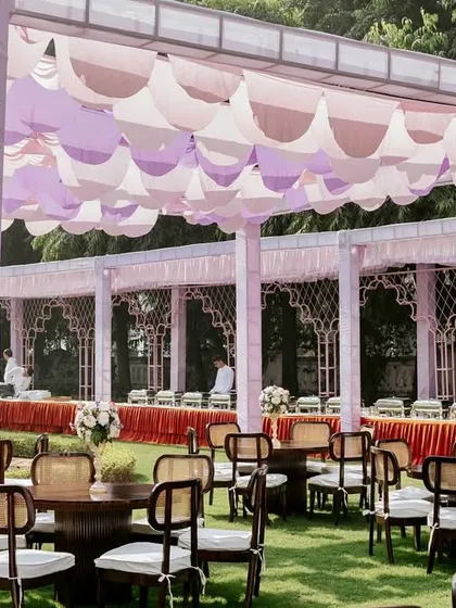 A view of the buffet line set against the elegant pastel canopies, ensuring that even the functional areas of the event are beautifully integrated into the overall design.