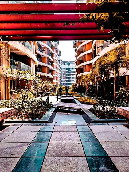 At the heart of our Palm Bellagio project in Raipur is this central promenade. We believe master planning is about creating spaces for people, and this landscaped courtyard with its water features and seating areas is designed to be the social core of the community.