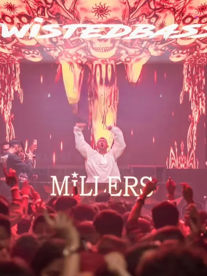 The energy at Millers in Pune was insane. This shot captures me hyping up a sea of people under my custom skull visuals.