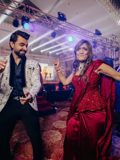 I don't just stay on the stage; I get on the dance floor with your guests. This is me joining the celebration, ensuring everyone feels the beat and becomes a part of the party. An interactive wedding host makes all the difference.
