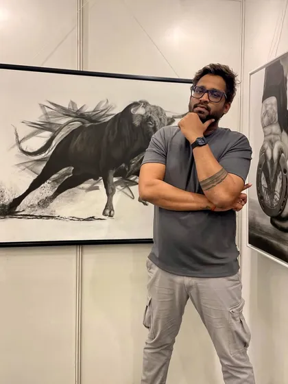 Posing with my artwork 'Mighty Rush' at an art show. Exhibitions are a fantastic opportunity to see how people connect with the energy of the pieces in person.