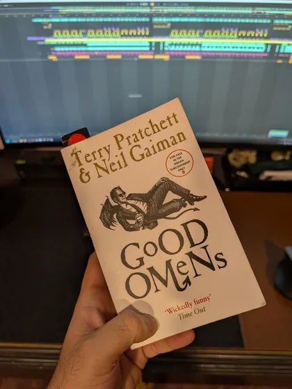 My current read, "Good Omens," sitting on my studio desk. Inspiration can come from anywhere, not just from music.
