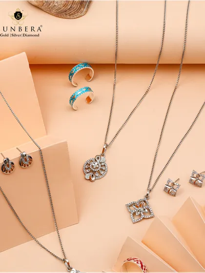 Silver that speaks elegance. This collection includes delicate chain and pendant sets, earrings, and rings, all finely curated for a timeless look.