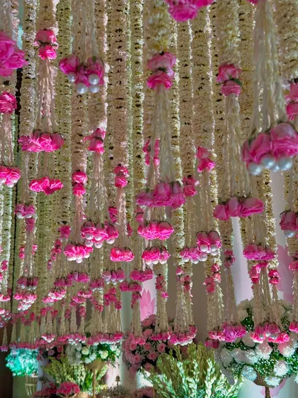 Different angles of the magnificent floral ceiling. These images showcase the density and artistry of the hanging blooms, which lend their magic to the entire venue.