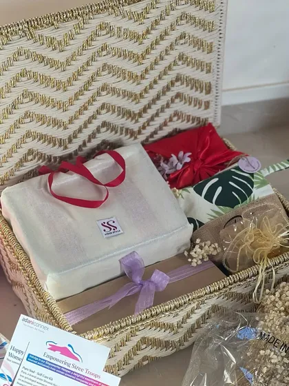 A look inside the Women's Day hamper for Adani Connex. Each basket was filled with a personalized bag, a furoshiki-wrapped gift, and other thoughtful items.