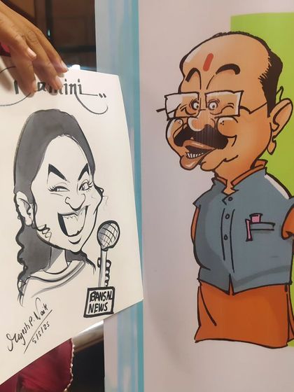 A client shared this image of my caricature of news anchor Damini Banjare placed next to another artwork. It's great to see my art out in the world.