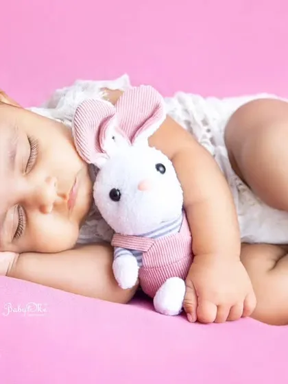 Another angle of this precious moment, showing her sweet profile as she sleeps. I love capturing multiple shots to give parents a variety of beautiful memories.