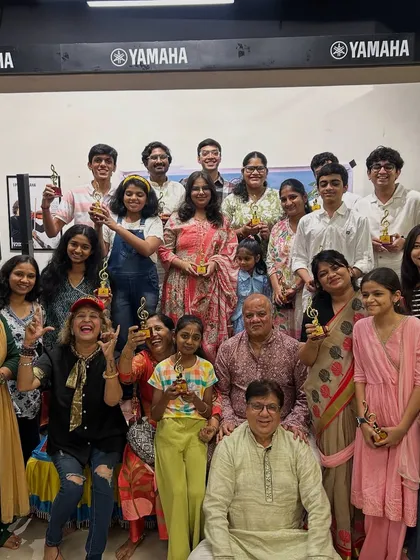 This is our tribe. A snapshot from our Guru Purnima Utsav, celebrating the achievements of our students, young and old, with trophies and loud applause. We are a community of performers, learners, and music lovers.