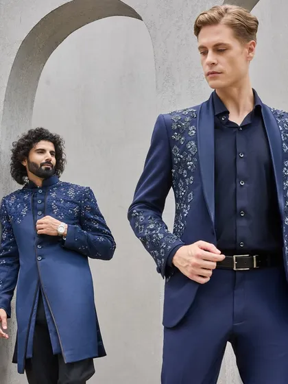 Here, I've styled a modern groom in an embroidered Western suit alongside his brother in a coordinated Indo-Western sherwani. This shows how I create a cohesive, sartorial story for the entire family during wedding celebrations.