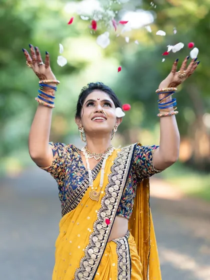 A moment of pure joy. The minimal makeup ensures that her natural expression is the highlight of the photograph.