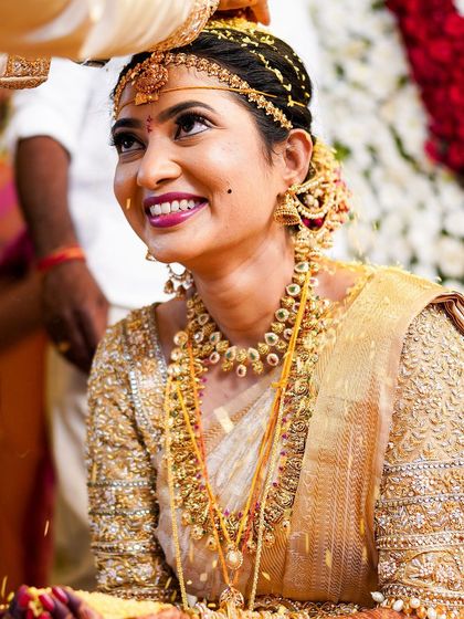 A lovely upward glance from the bride, showing off the detailed eye makeup and beautiful lip color.