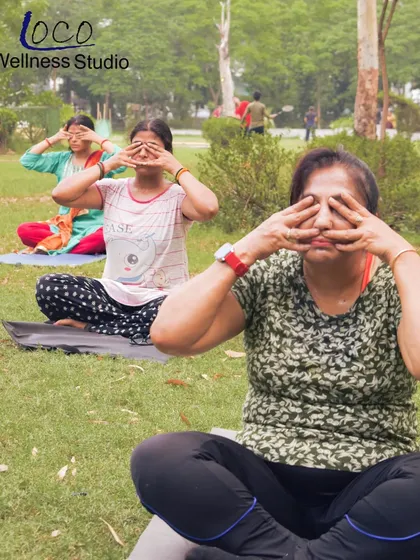 Participants practicing Bhramari Pranayama (Bee Breath) during our free yoga and meditation workshop in the park. This calming breathing exercise is great for relieving stress and anxiety.