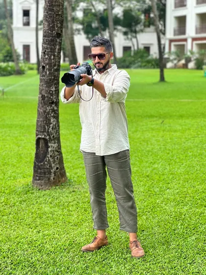 A candid of me at work, fully focused on capturing the scene through my lens.