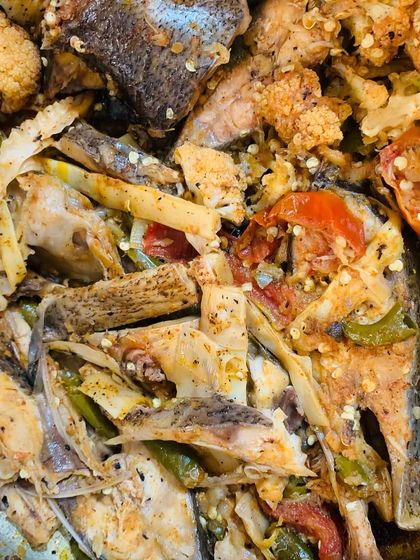 A close-up of the fish and vegetable medley.