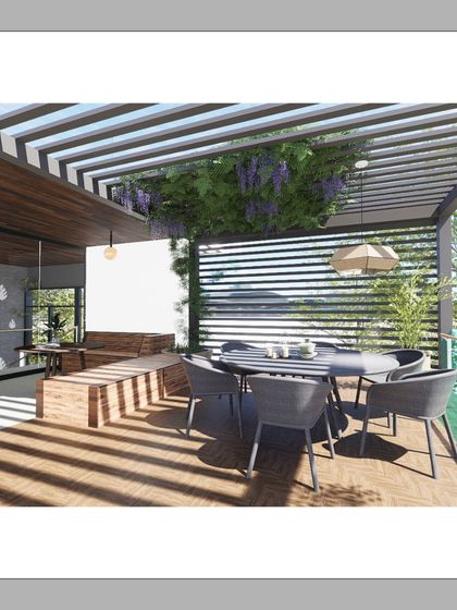 This shaded terrace at The Courtyard Glasshouse extends the living space outdoors. The pergola provides relief from the sun while allowing for natural ventilation, creating a comfortable outdoor room for dining and relaxing.