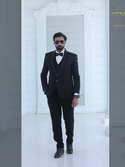 For the groom who appreciates classic style. This sharp black tuxedo is a timeless choice for a reception or cocktail event. It's a perfect example of the premium groom's wear you can find in my collection, available for sale at an amazing price.