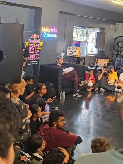 A candid moment of learning and observation during the Red Bull BC One event.