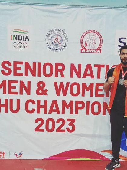 Our champion, Abhi Tanwar, with his silver medal at the 32nd Senior National Wushu Championship 2023.