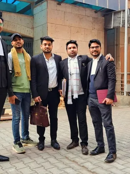 With my colleagues outside the court's filing centre. Teamwork is essential in litigation, whether we are discussing case strategy or managing the extensive paperwork involved in a civil suit.