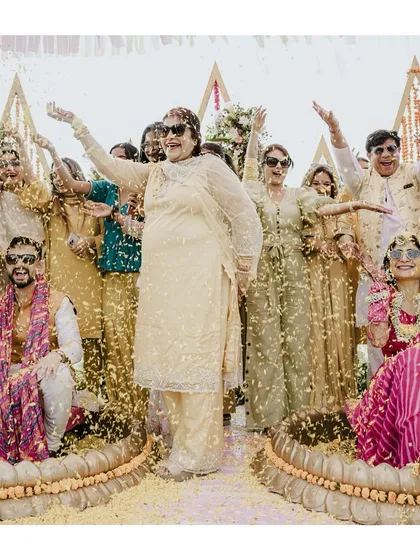 A Haldi ceremony filled with laughter and surrounded by friends and family. We focus on capturing the collective joy and the candid interactions that make these events so special.