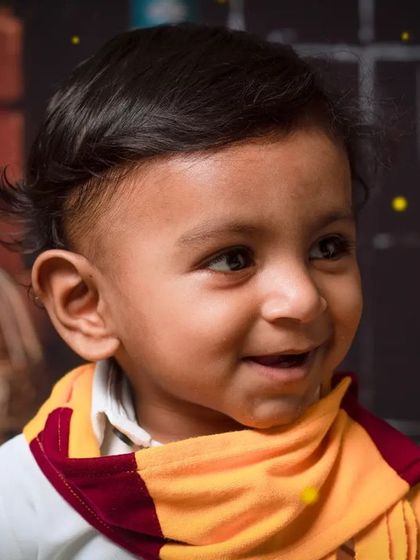 A close-up of a happy little wizard. These mini sessions are a great way to get a few magical portraits of your child in their favorite theme.